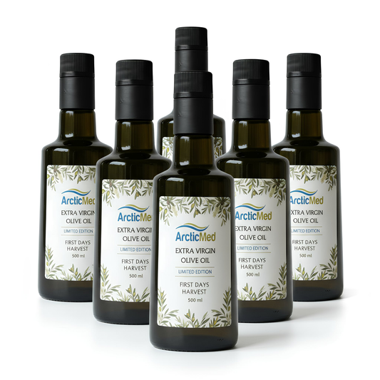 Six bottles of ArcticMed extra virgin olive oil, 500 ml each, with a white label featuring green leaf designs.